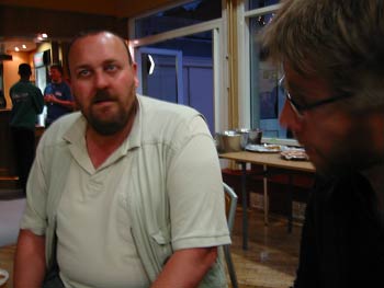 Nigel from our quiz team, thinking he's sure he knows the answer. Tom looks on, clueless.