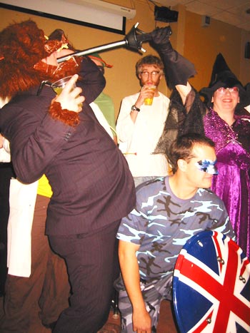 Tom still nursing that pint, cool and collected as ever, whilst a bit of aggro breaks out between a witch and a wolfman. This fancy dress lark brings out the nastiest sides of people.
