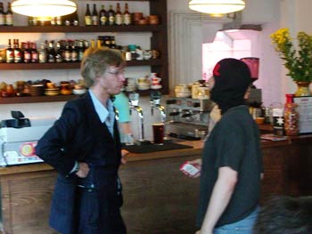 Tom's game follows him to the bar where Ian tries to negotiate an evil deal