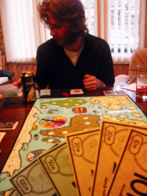 Tom wonders where to lay his first villages, while Andy S (not pictured) admires his cash.