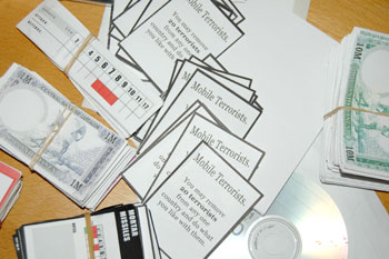 Cards and cash. Including the very first cards, used only once for a nine hour killer game