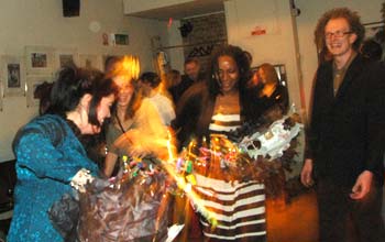 Sam, Ali and Babs smell the candy and pull the Piñata's head off