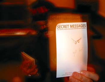 The messages says "get her" in case you can't read it. Not sure if this is threatening, or camp.