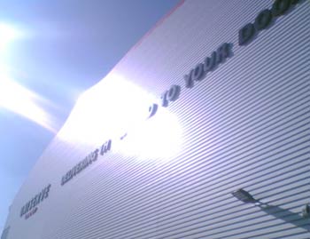 Uniserve's motto in the glorious midday sun: "Delivering ________ to your door". We'll leave you to fill in the blank.
