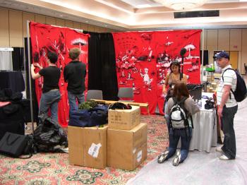 Backdrops go up first - they look great. People keep asking where we got them made, we just point at Tom and roll our eyes.