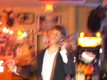 Tom, on fire, comes out on top as pool king for the night.