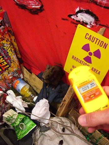 We got this pocket Geiger counter from <a href="http://www.pocketrad.com">Pocketrad</a>. Our booth is safe. We think.