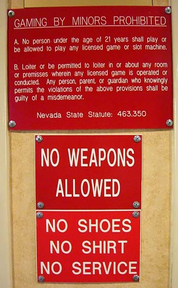 What about shoes but no shirt, or vice versa? Or boots and a sweater? Or sandals and a pashmina? Some of these signs are pretty confusing.