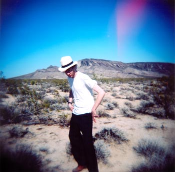 Tom in Death Valley, shooting stones with fingers