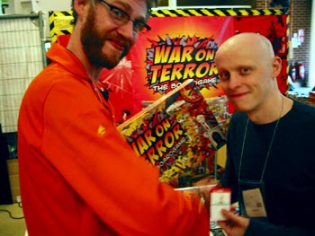 Second WMD found under the stairs. This is <a href="http://brooksart.deviantart.com/">Mark Brooks</a>, one of the VIP artists at GenCon, looking rather scared.