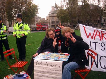 Fucking hippies. Why aren't those coppers doing their job and beating the shit out of those unwashed lepers?