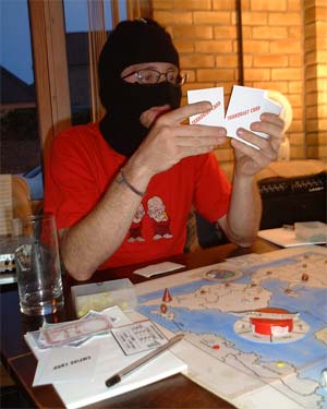 Ian contemplates his latest catch of terrorist cards.