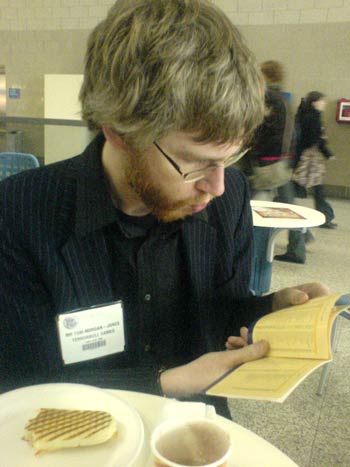 Tom over breakfast, sizing up the day's victims - err, appointments