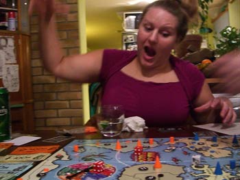 Jenn starts beligerently, threatening to use the secret 'Godzilla' move on Tom