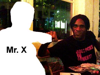 The terrorist champions, doing an ironic 'fist bump' - no doubt  as a knowing, post-modern reference to the <a href="http://snipurl.com/34bha">New Yorker's wounded attempt at 'satire'</a>