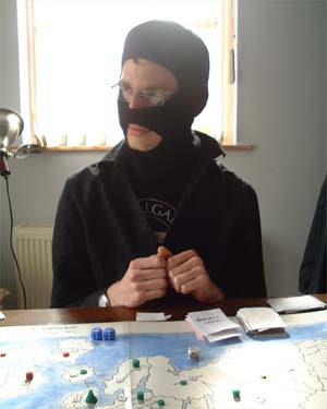 Tom, managing to look diplomatic and evil at the same time.