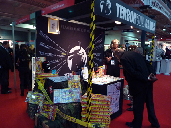 We found our stand worked too well - the colours kept attracting people who would approach just like this gentleman: head first; feet back, ready to make a quick escape