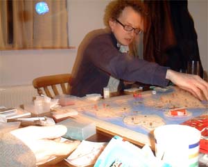 Check out the mid-air dice action, whilst Andy T frets about war-mongering.
