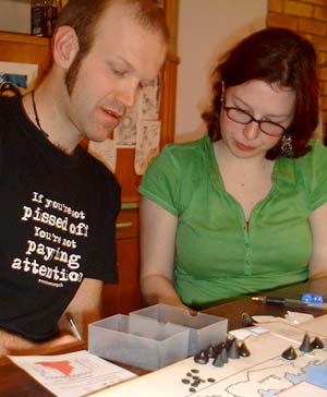 Secret messages can be made doubly secret by passing and reading them under the table.