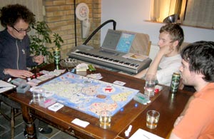 Early game, the spectators watch on as Andy T makes his moves...