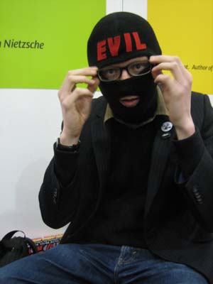 Andy T practising his 'evil gaze'. Why it says "Nieztsche" in the background, I have no idea.