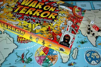 Axis of Evil spinner on the board and front of box